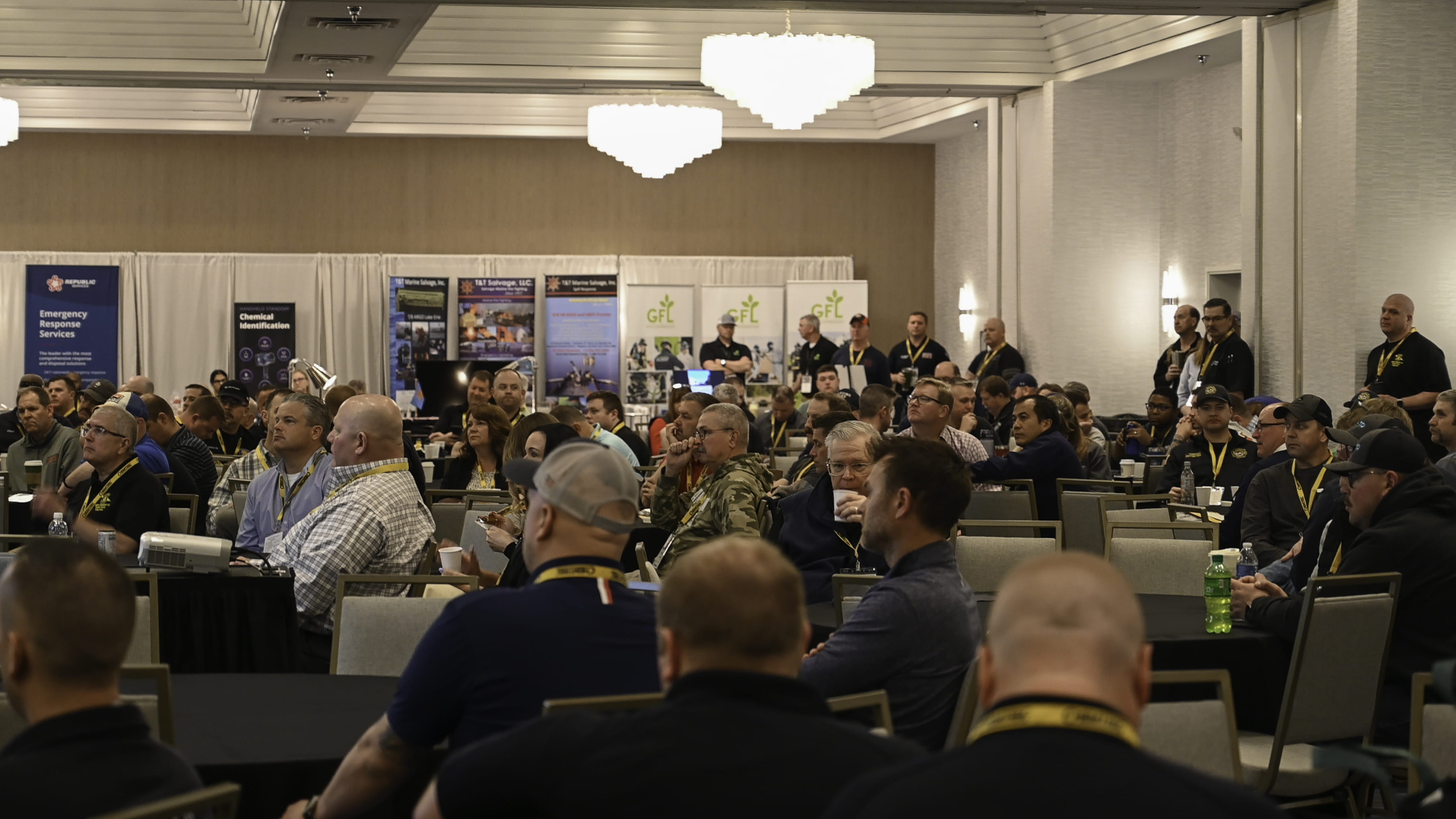 People gathered in a large room for the Michigan Hazmat Responder Conference. 