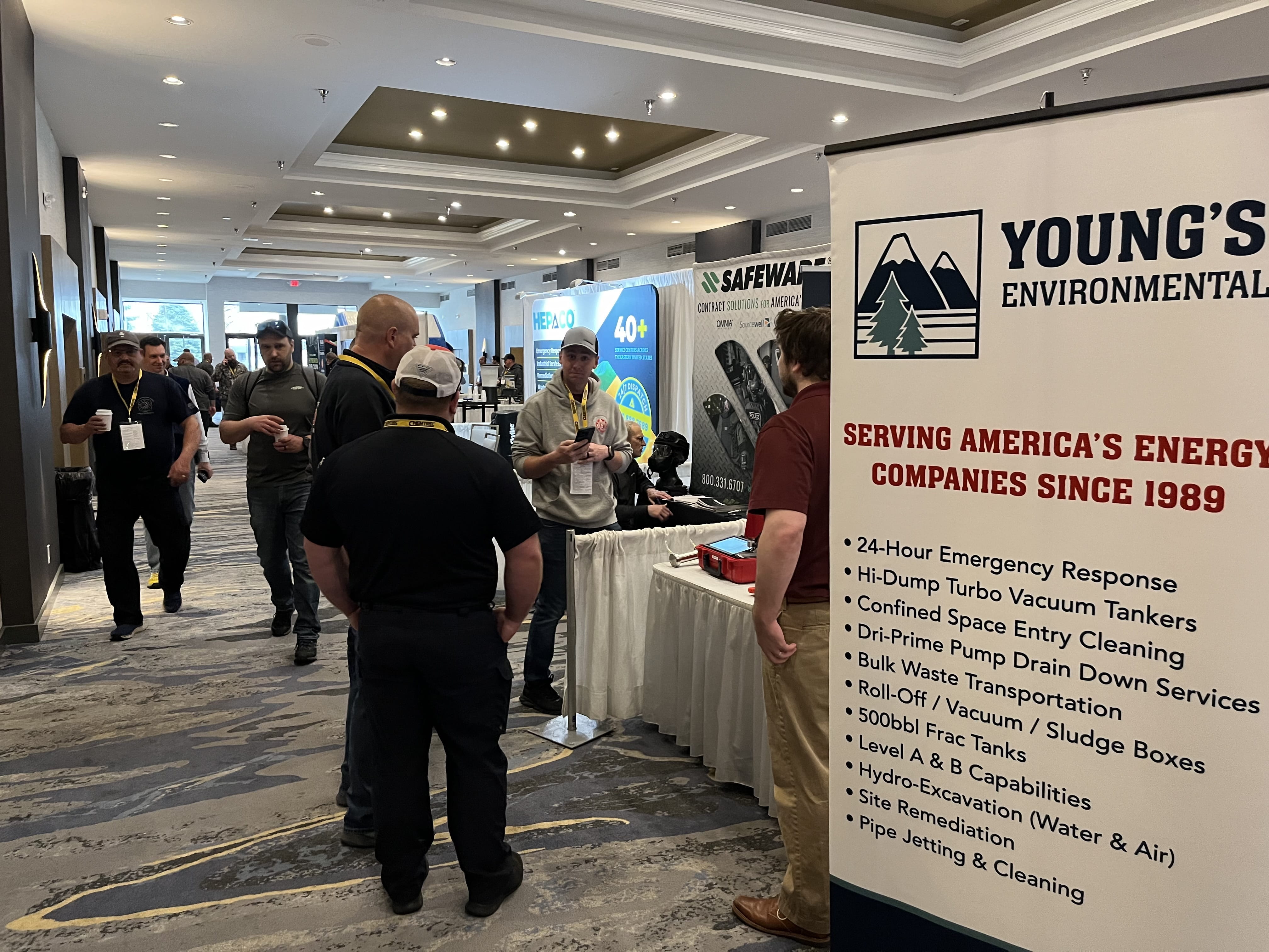 People talking to vendors at the Michigan Hazmat Responder Conference.