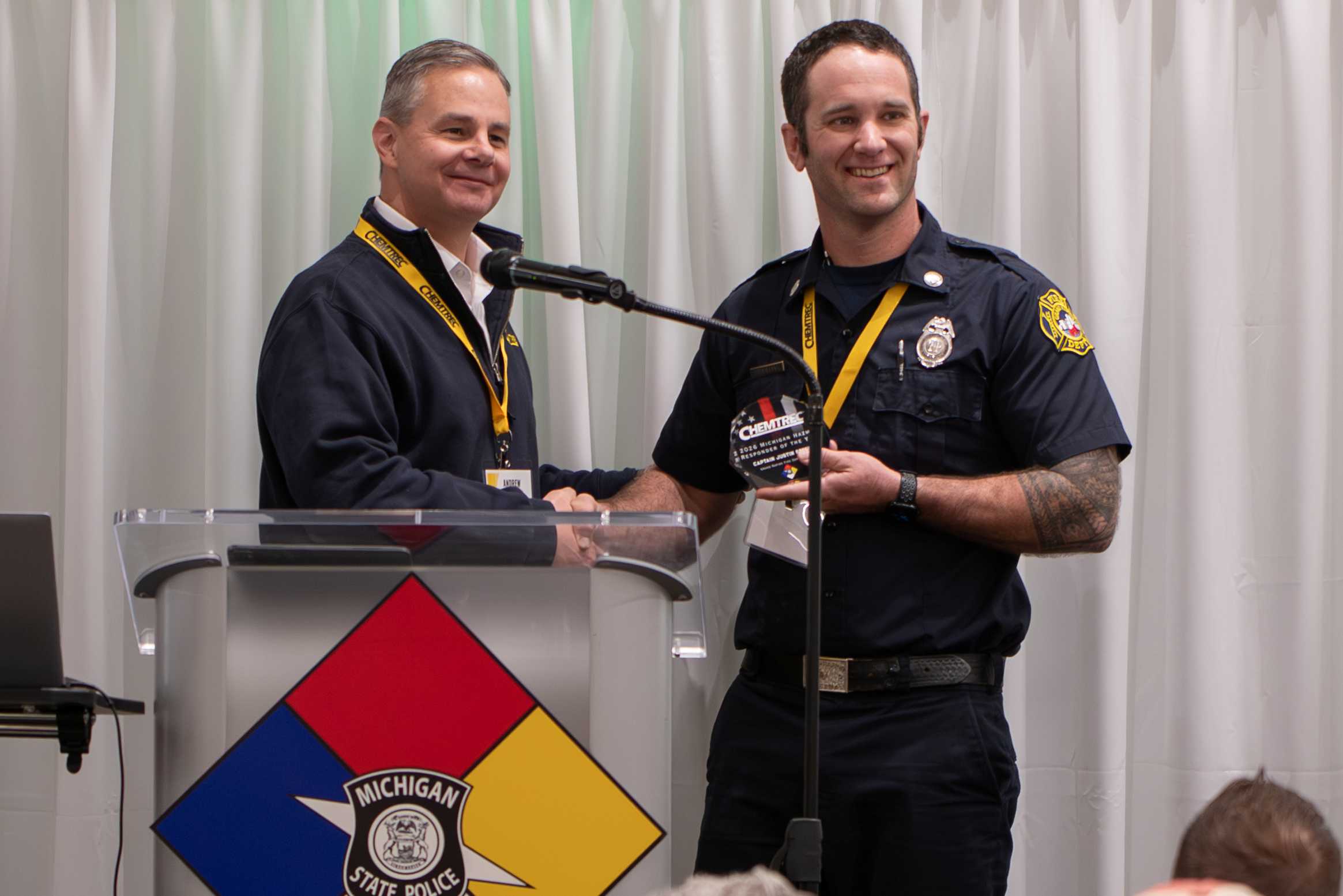 The Responder of the Year receiving their award at the 2025 MI Hazmat Responder Conference.