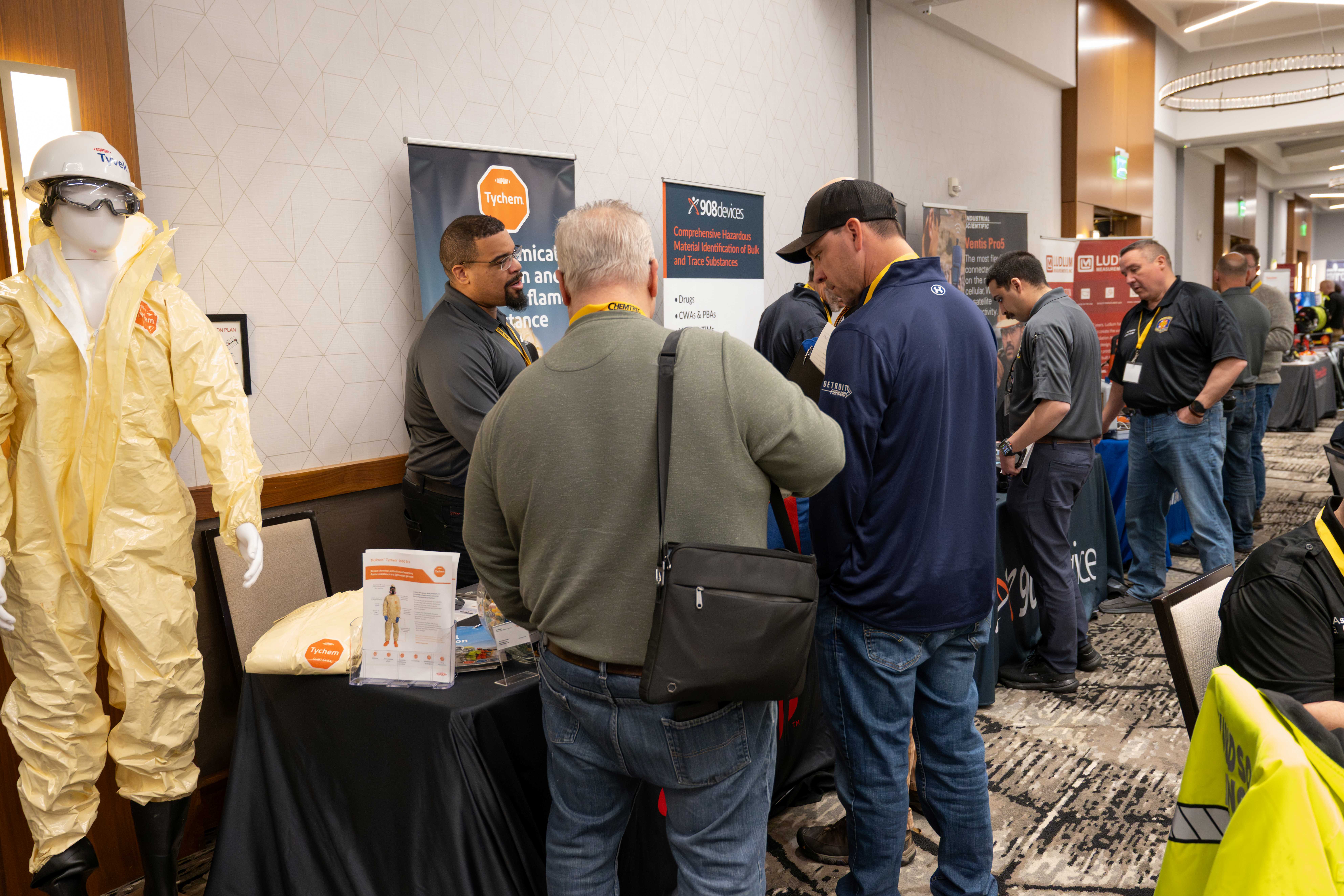 Attendees talking with exhibitors at the 2025 MI Hazmat Responder Conference.