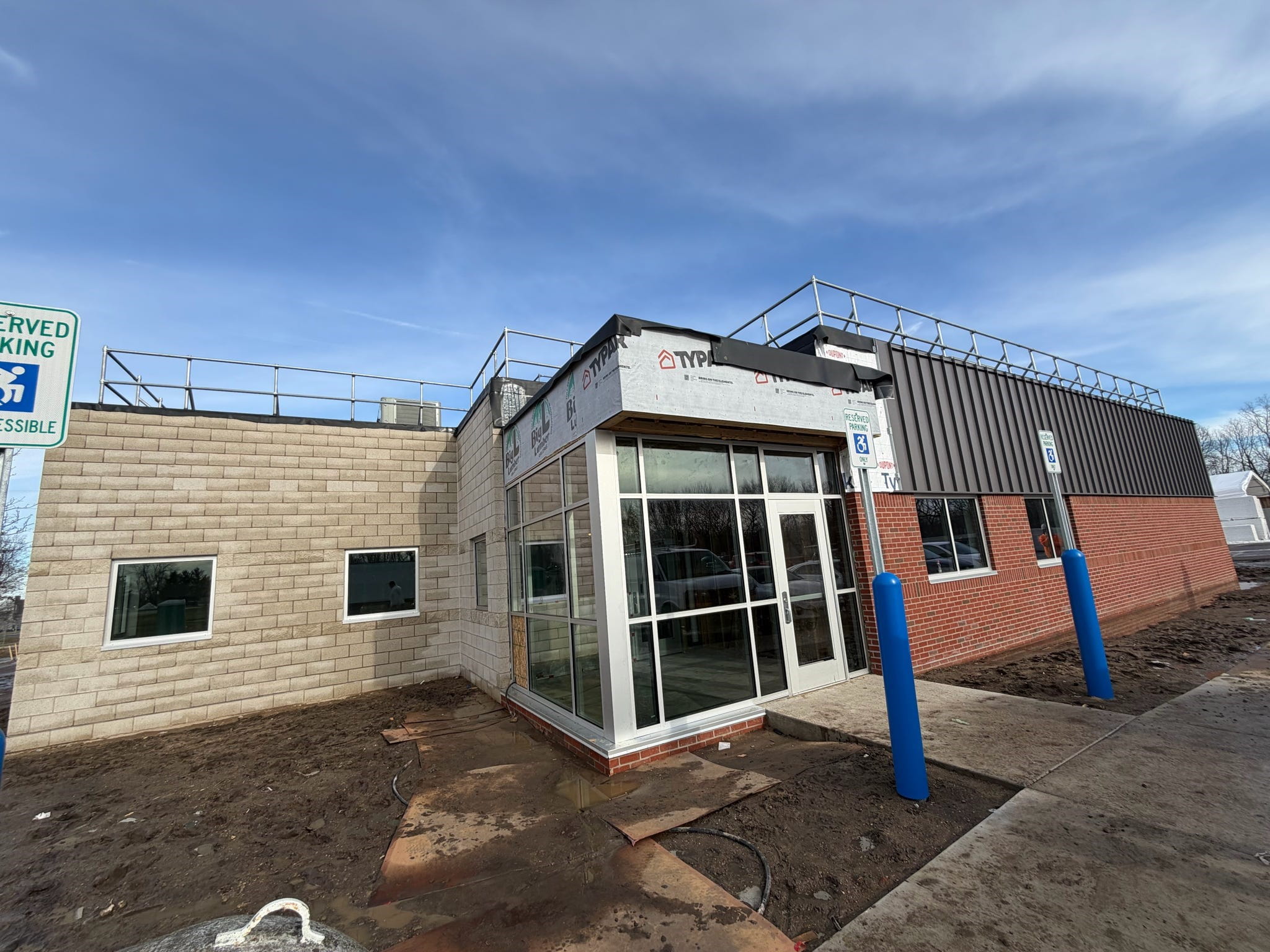 The front entrance of the building, mostly complete.