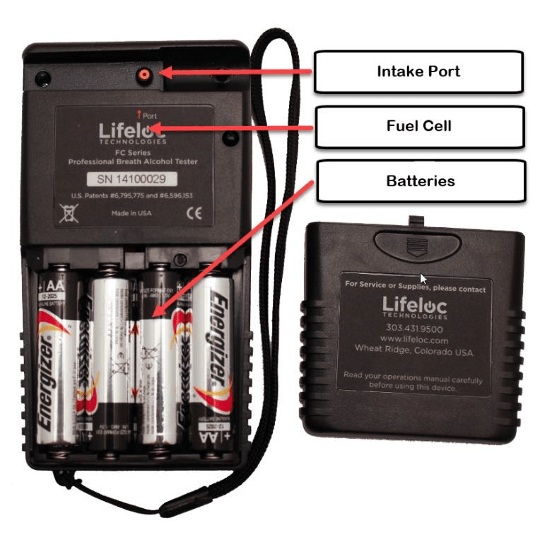 Back of Lifeloc instrument showing intake port, fuel cell, and batteries. 