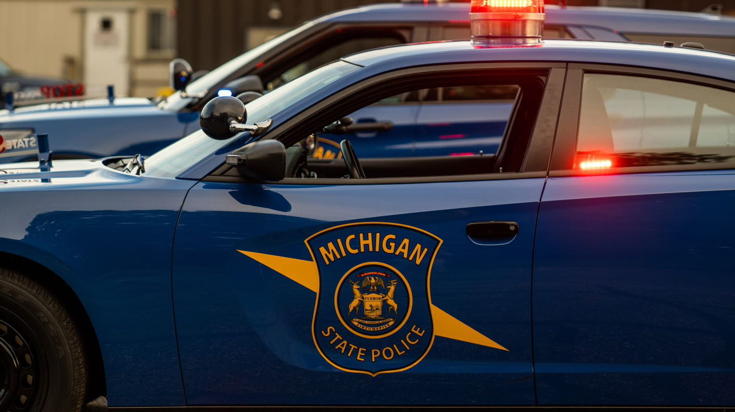 MSP patrol car with bubble light lit up. 