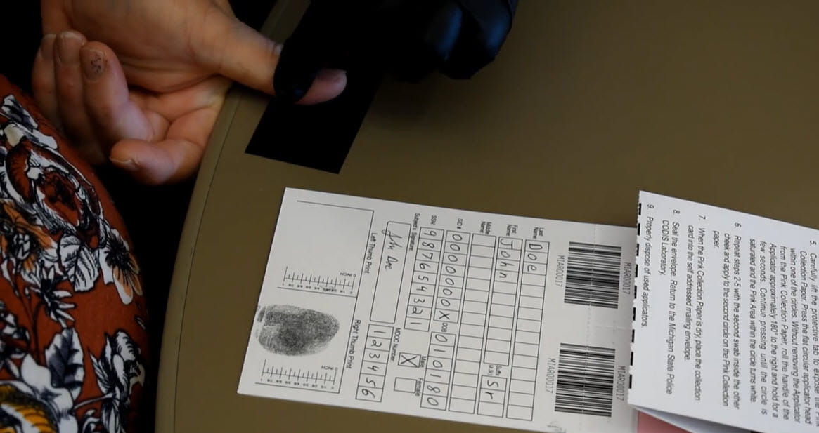 Close-up of fingerprint on a fingerprint capture card. 