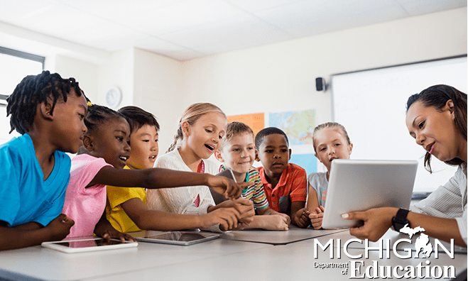 Diverse children learning from Teacher