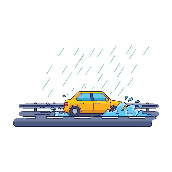 Car driving down a road with rain coming down and water splashing under car tires. 