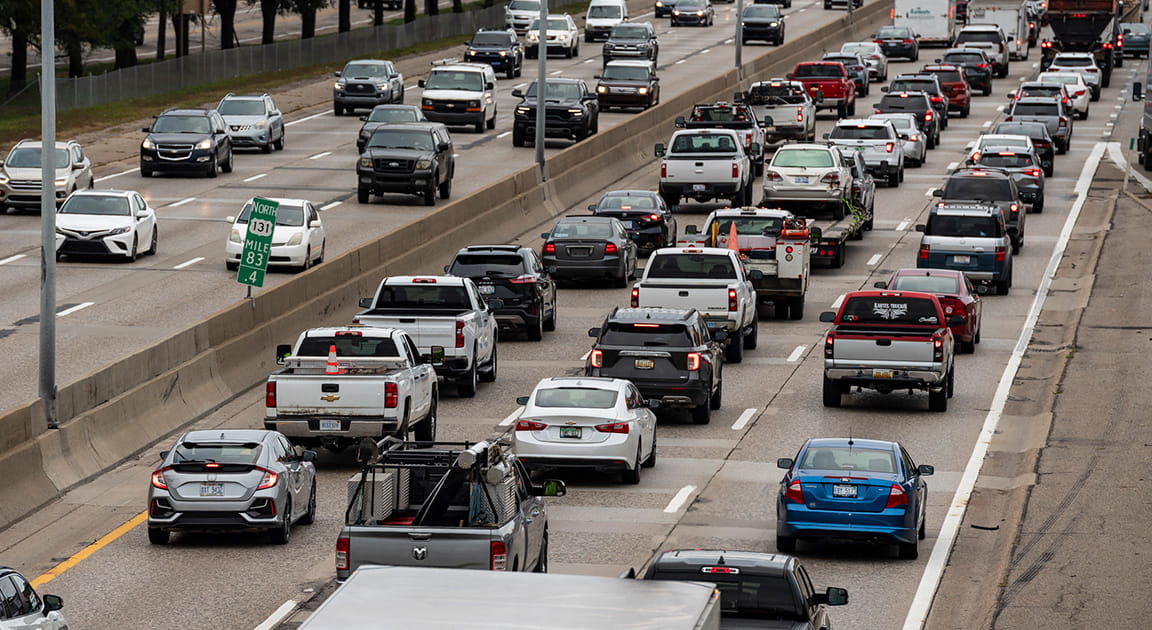 Several cars on the freeway.