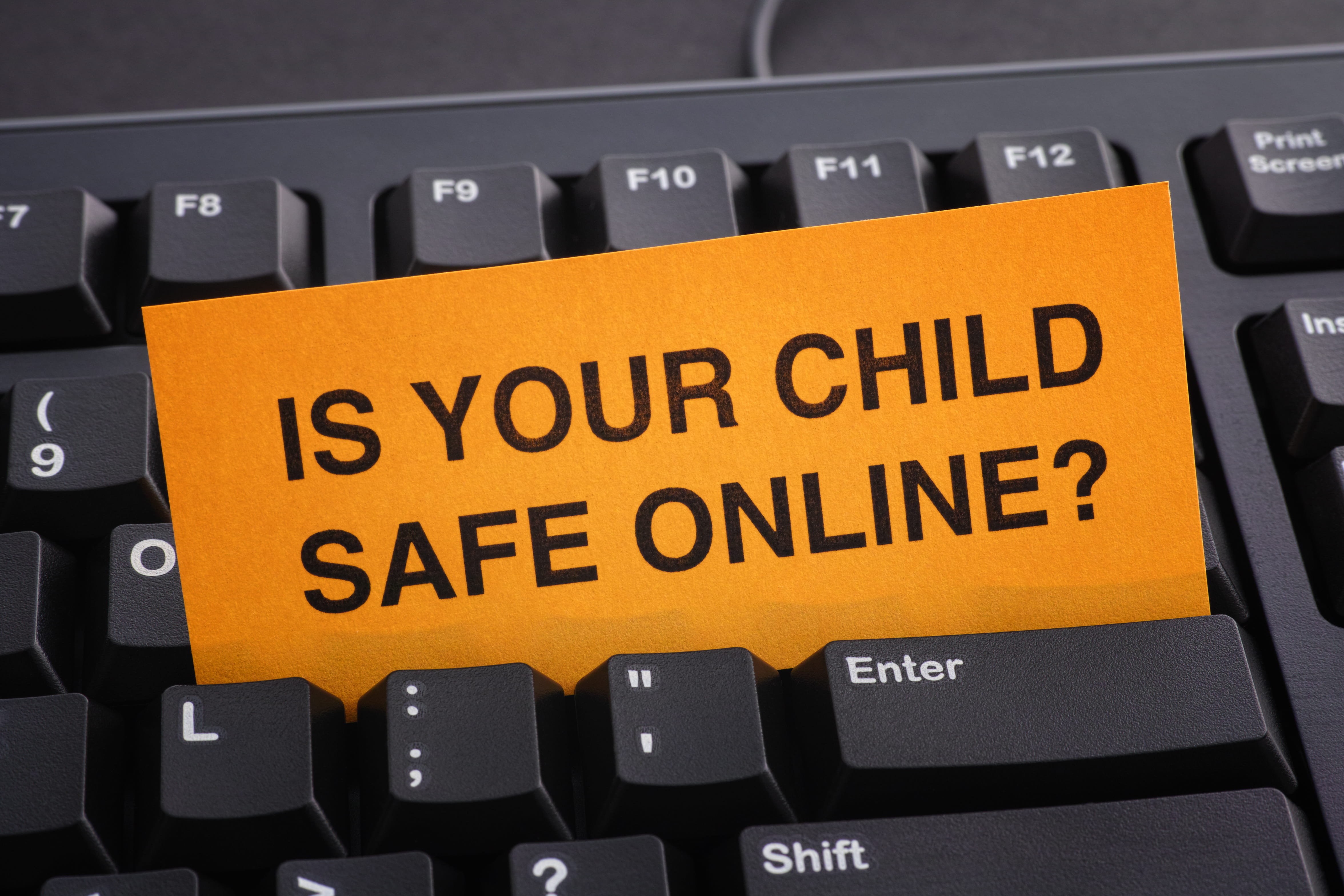 Is your child safe online? Note on keyboard. 