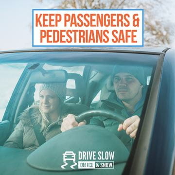 adults in winter jackets inside a car