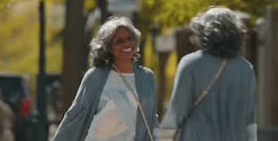 smiling lady walking