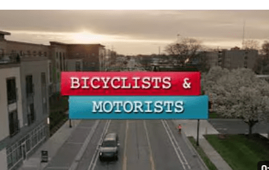 bicyclist and motorist share the road