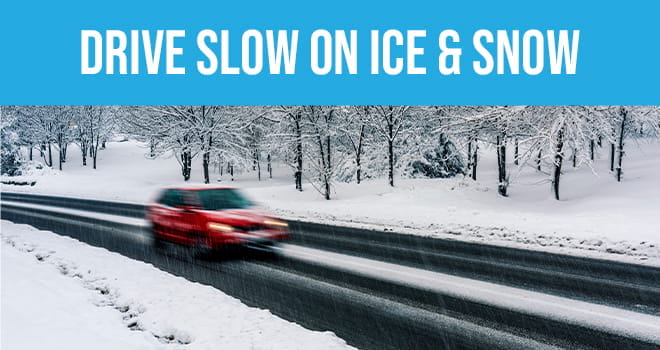 Car driving on snowy road