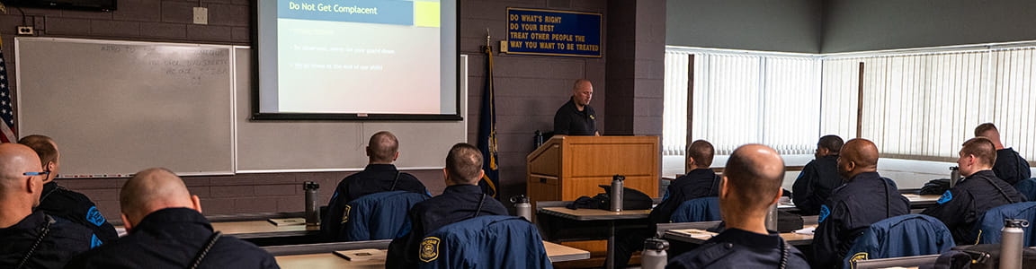Motor carrier officer recruits in classroom. 