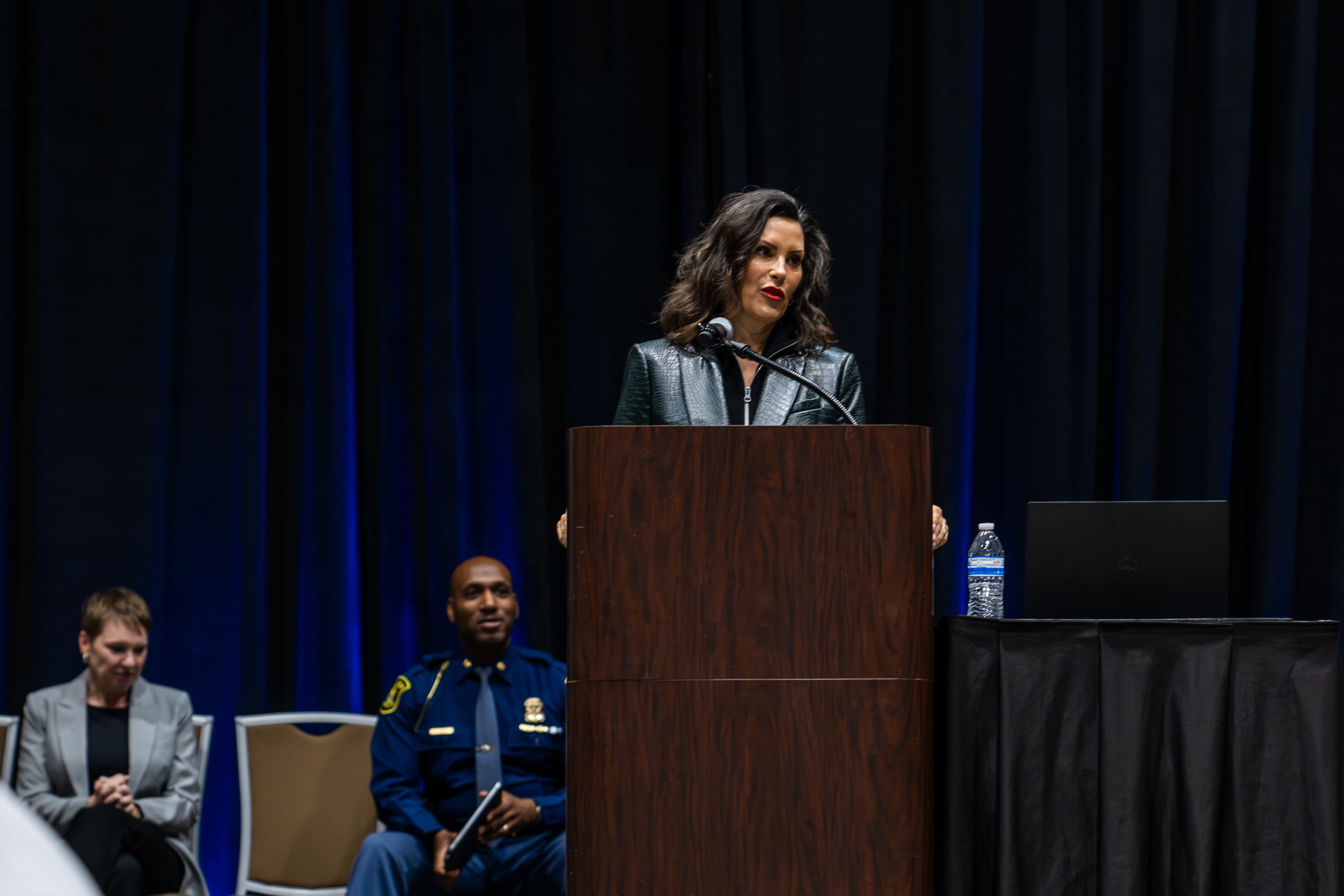Gov. Gretchen Whitmer speaking to attendees at the Gun Violence Intervention Summit