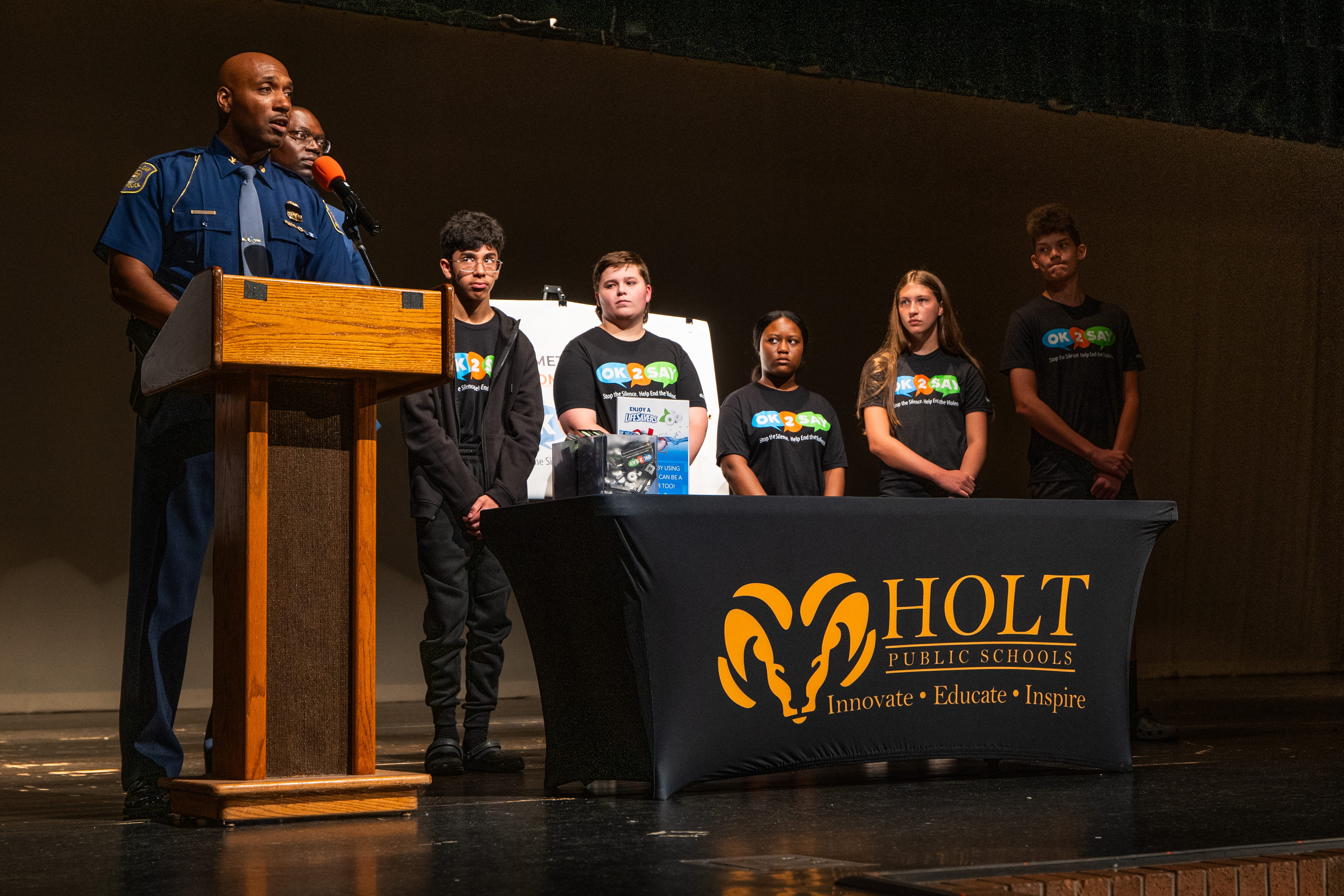 MSP Col. James F. Grady II speaking to a crowd of Holt Public Junior High School students
