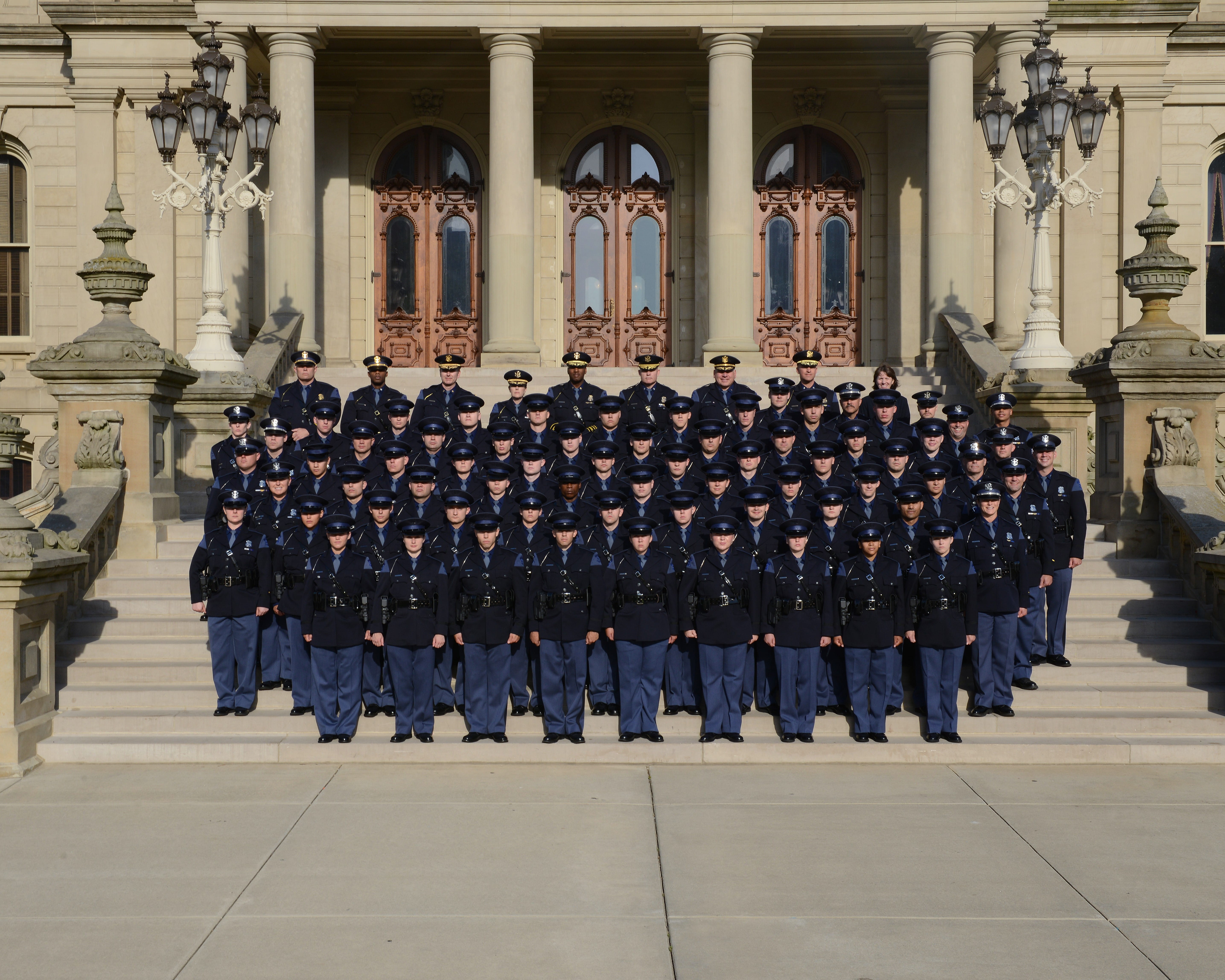 Group photo of 145th Trooper Recruit School standing on the Capitol steps