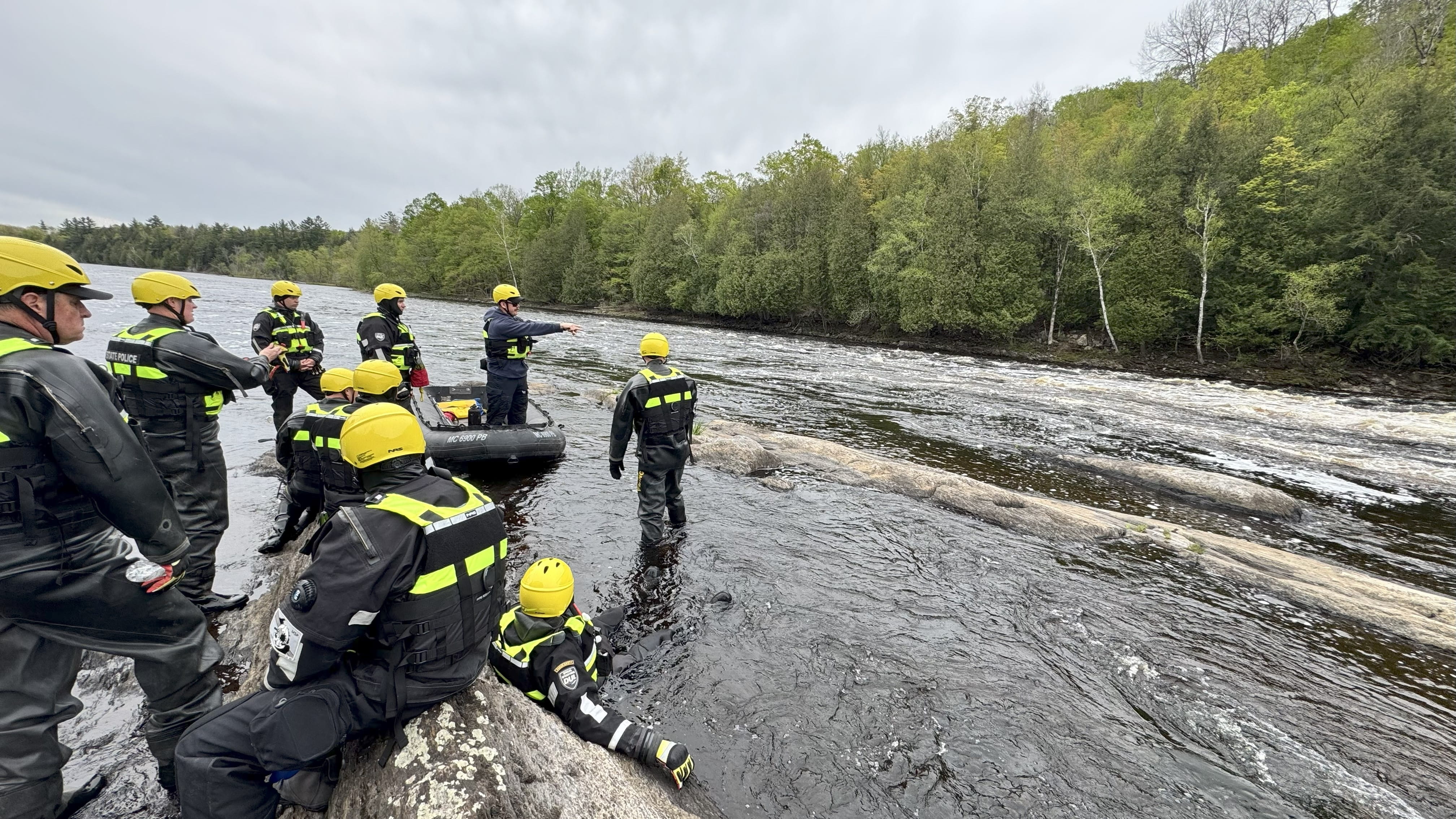 MSP Marine Services Team members Training with a group, in the water