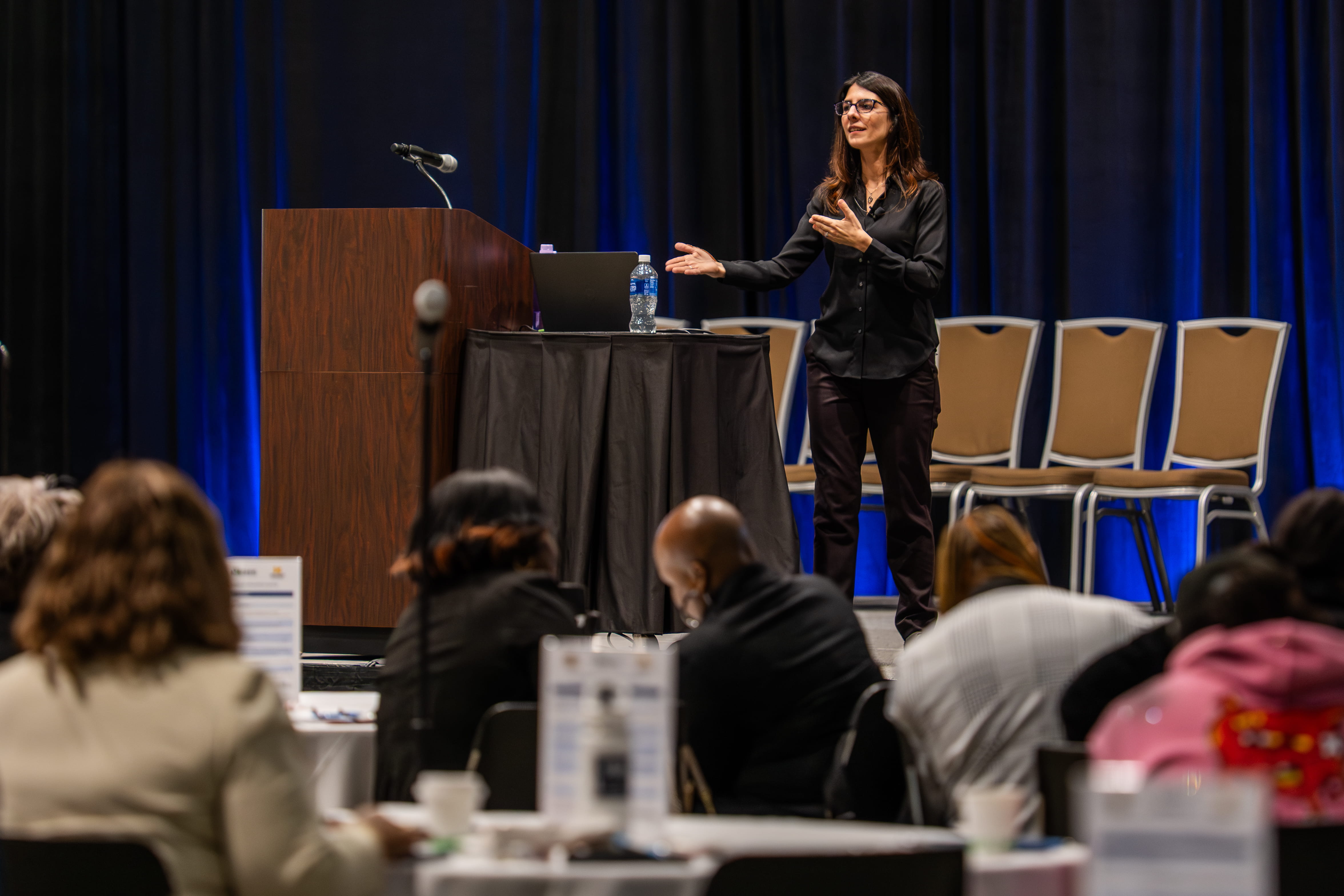 April Zeoli, PhD, MPH, associate professor and director of the University of Michigan Firearm Law Implementation Program, speaking with attendees of the Gun Violence Intervention Summit