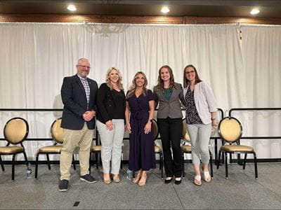 Group photo of employees participating in the civilian panel