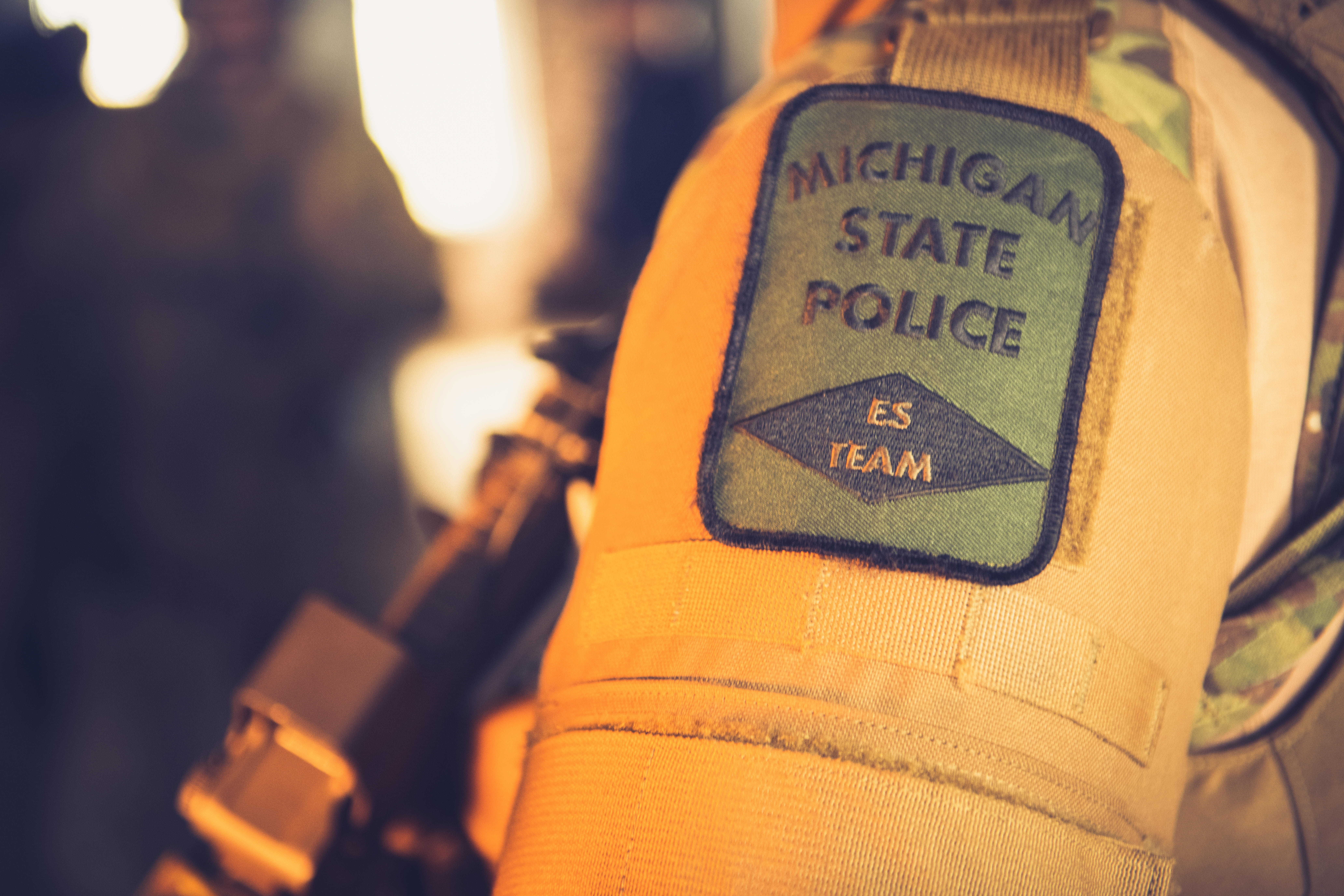Patch on the arm of a trooper that says Michigan State Police ES Team