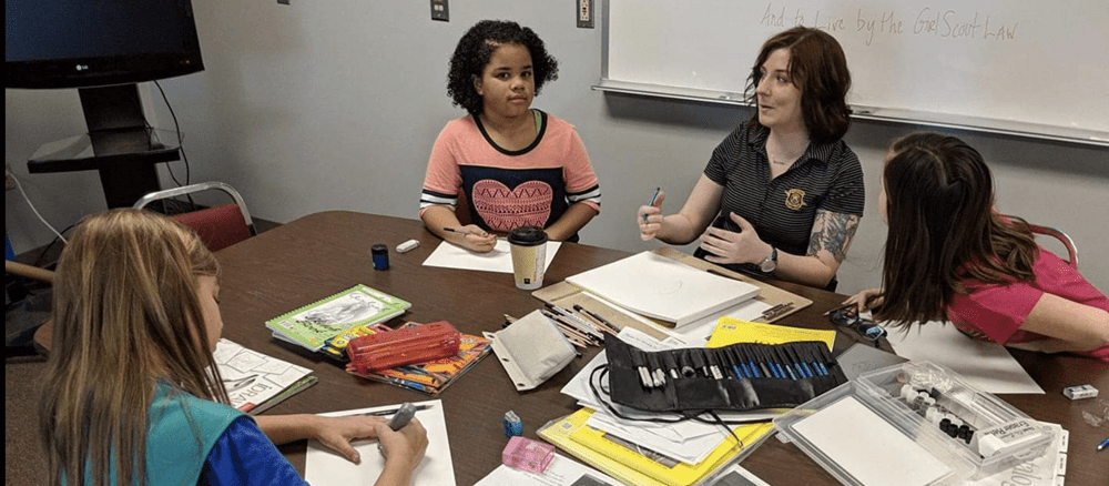 Photo ofTrooper Sieminski doing a classroom demonstration on the Forensic Art Unit