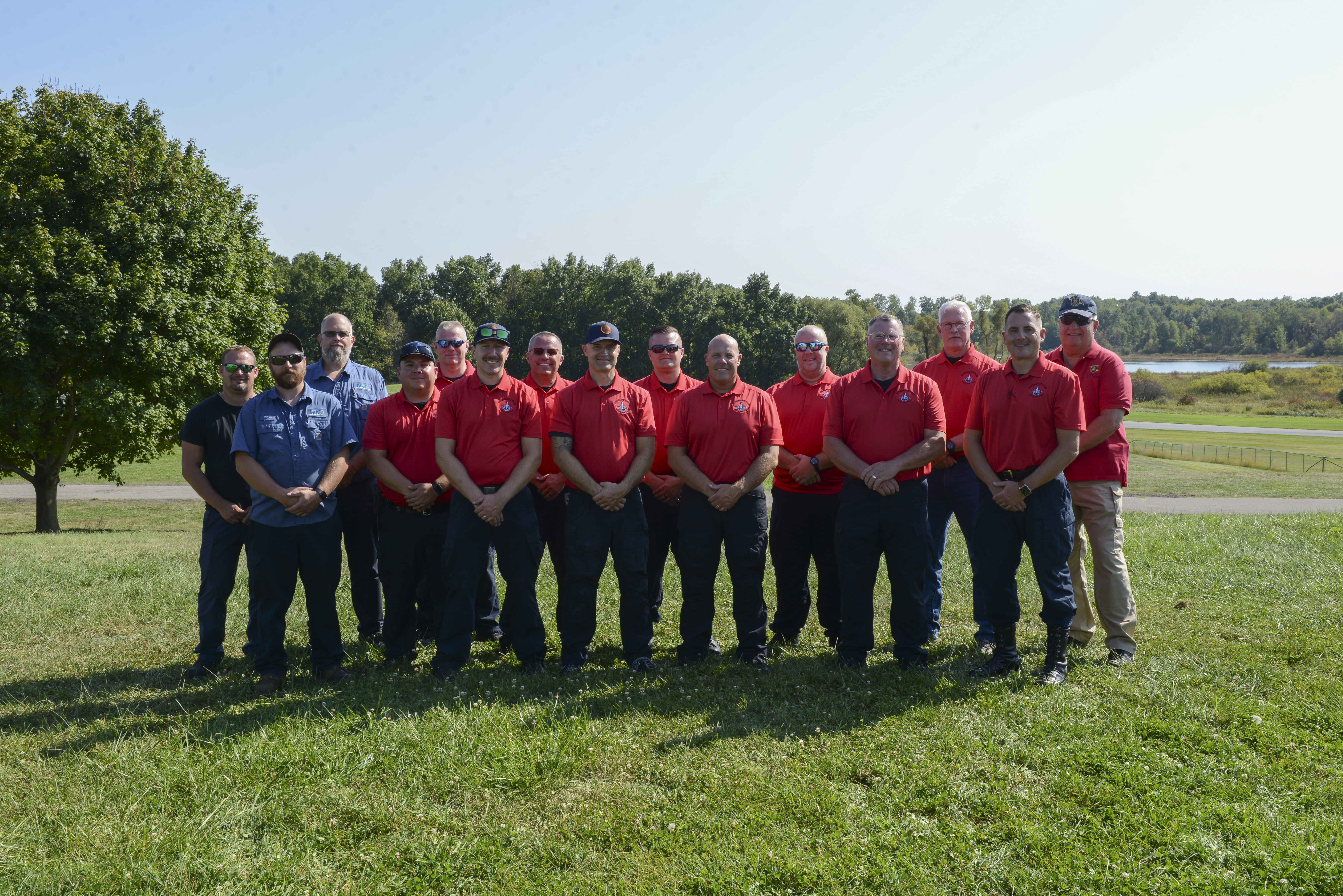 Vehicle test team standing in a group outside