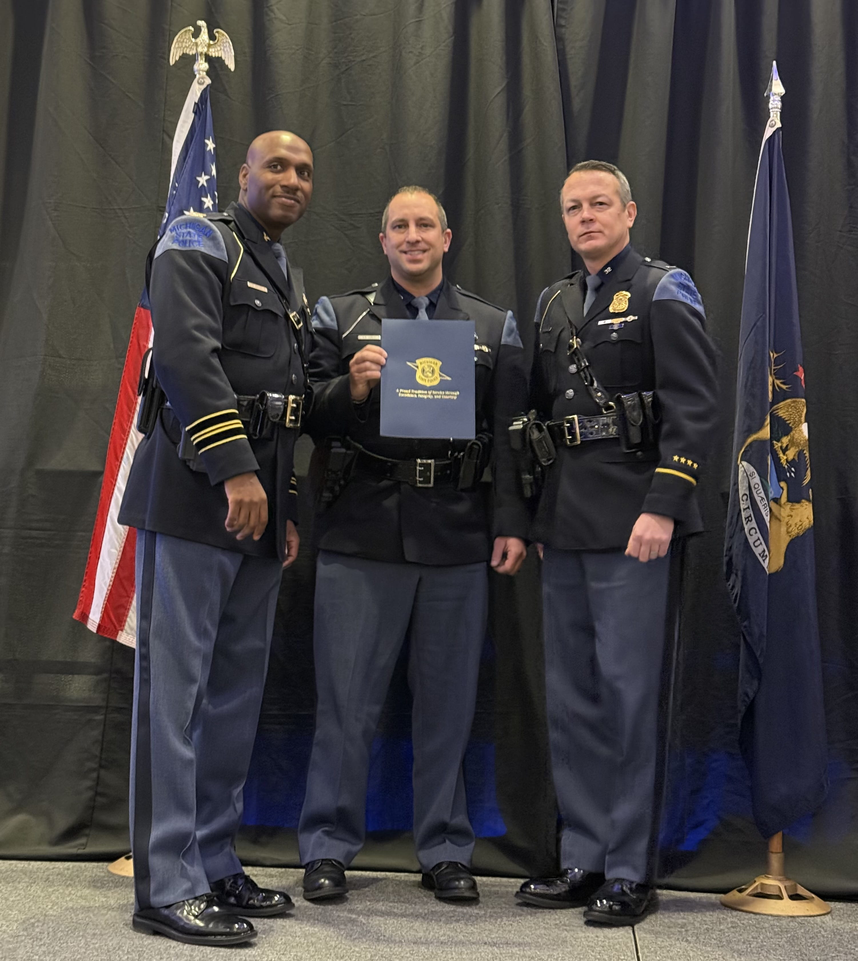 Members of the West Branch Post posing for a photo with Colonel Grady