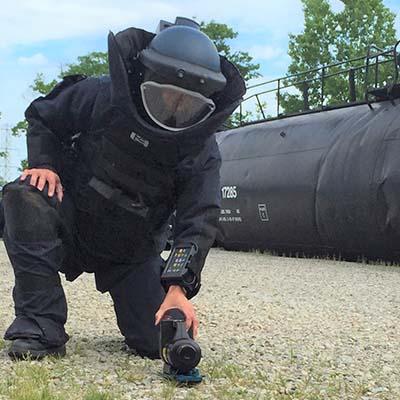 picture of bomb squad member in bomb suit