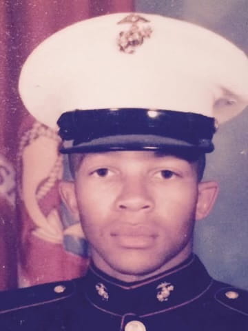 Brian L. Love, in the Marines