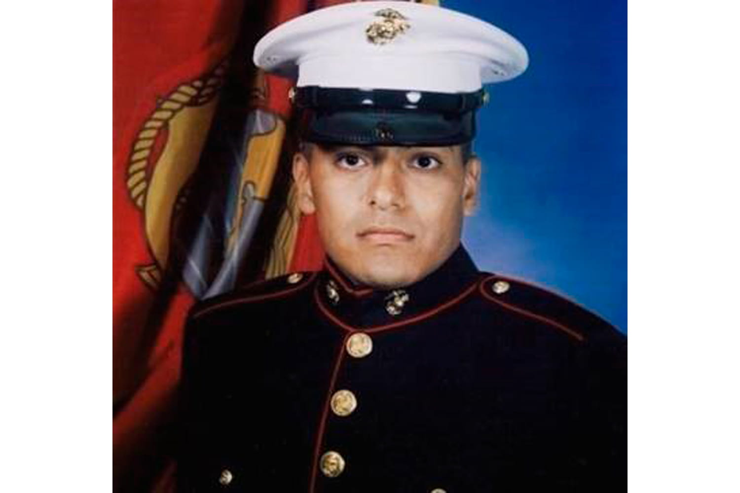 Headshot of Carlos Castillo in dress blues