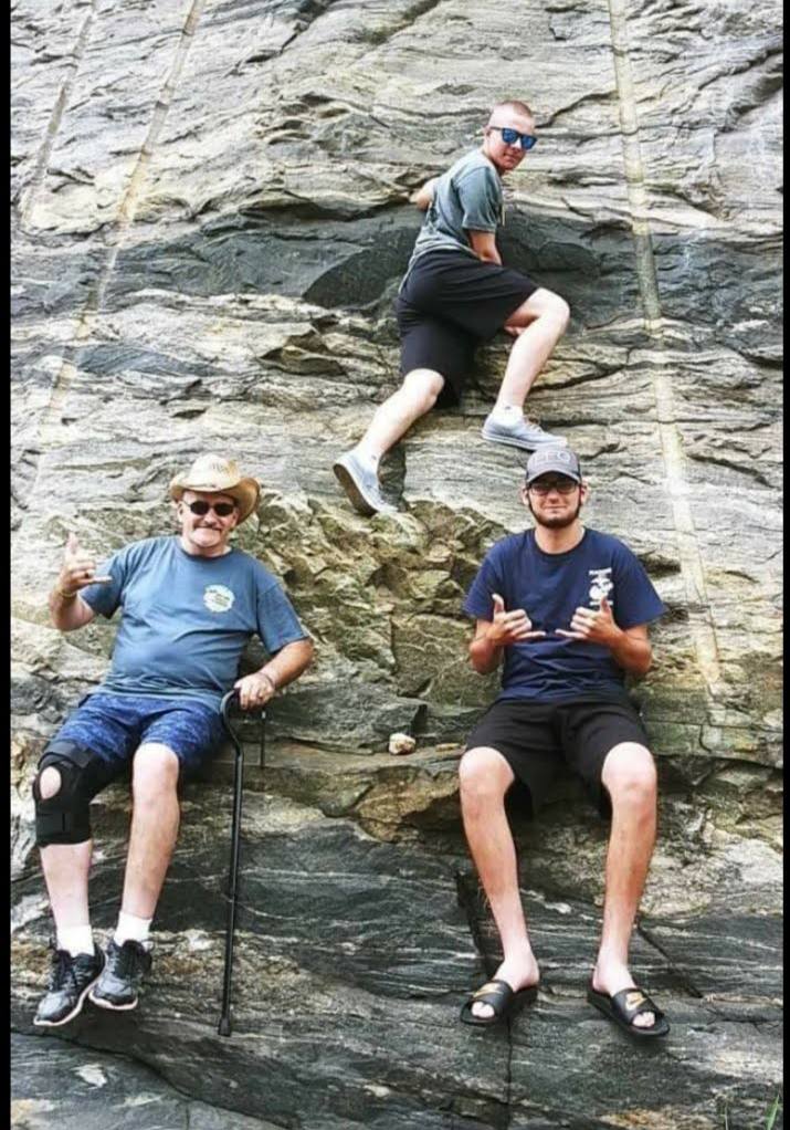 Doug Brinker rock climbing
