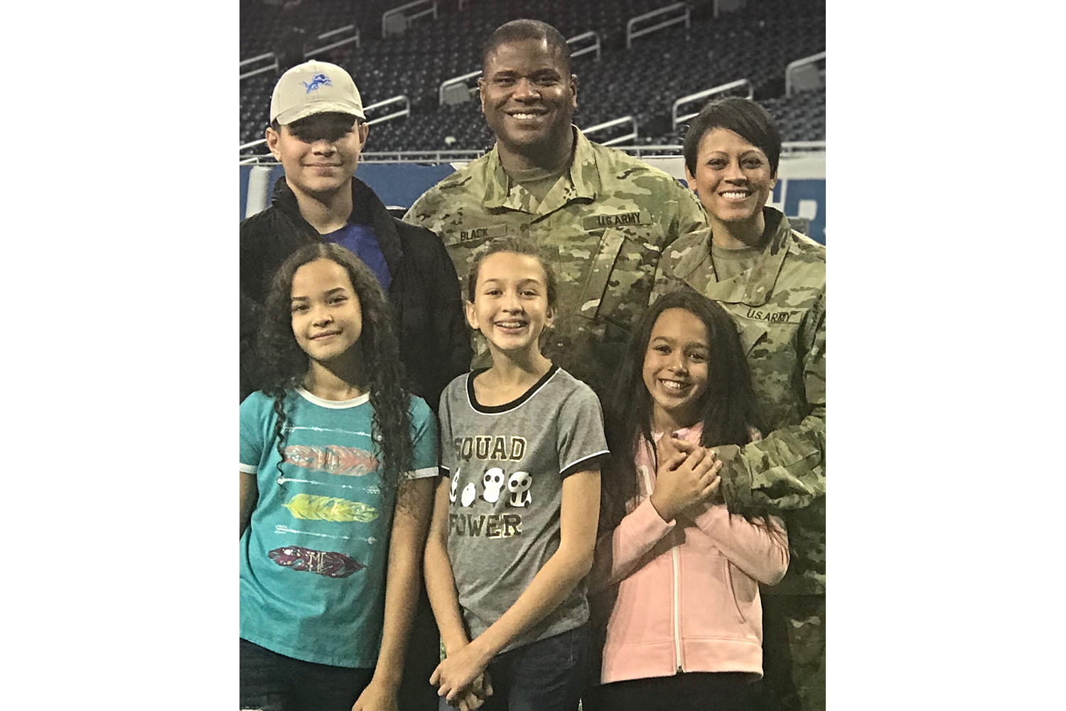 photo of Lorrena Black standing with her family