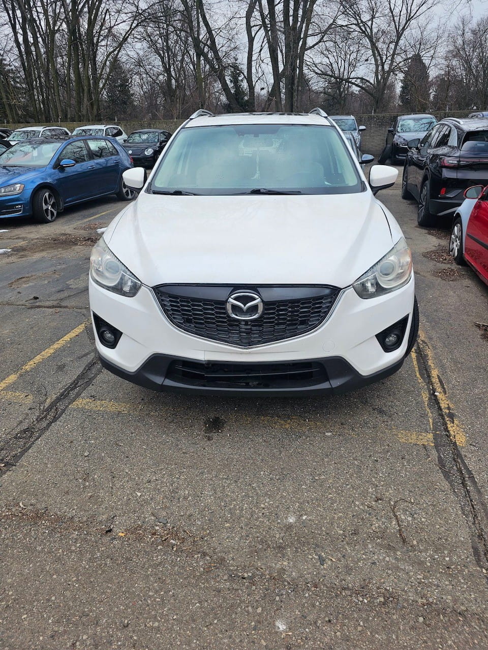Chelsey Demick's vehicle, a 2015 white Mazda CX-5