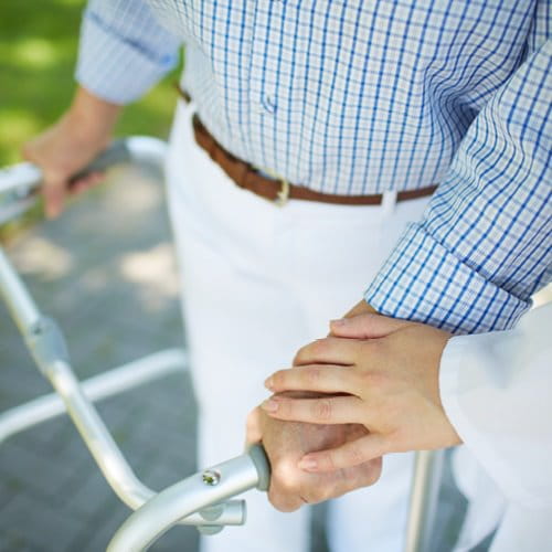 Elderly man with walker