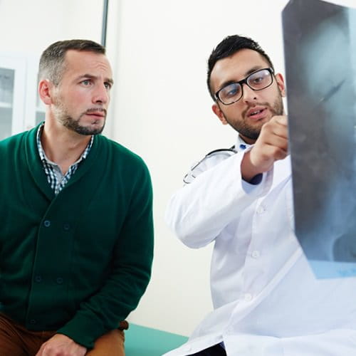 Veteran reviewing results with doctor
