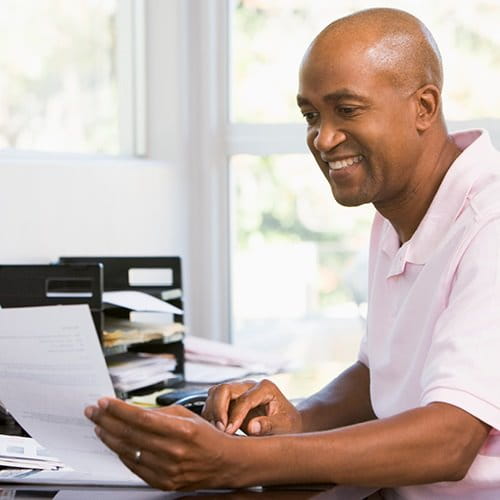 Man looking at papers