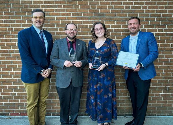 MVAA Strategic Communications team poses for a photo with their awards at the Central Michigan Public Relations Society of America Award Cermony