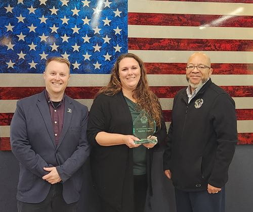 Erik Schreur, MVAA employment analyst; Katie Bigelow, Mettle Ops president and chief executive officer; and Brian L. Love, MVAA director