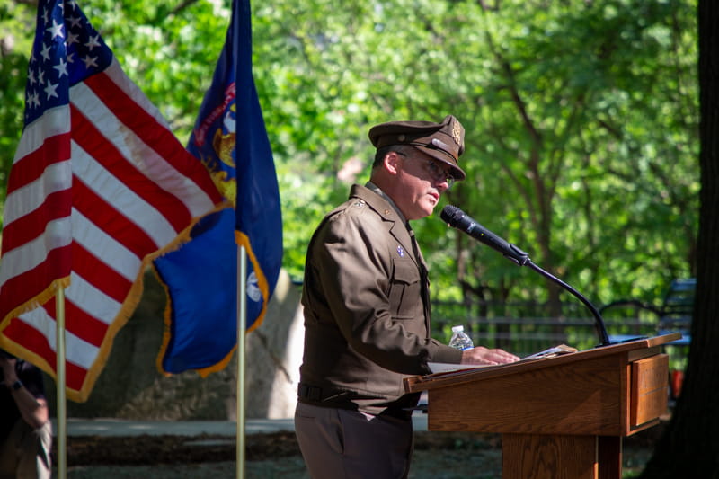 Brigadier General Jeffery Terrill speaks at the Michigan State University Memorial Grove Rededication Ceremony.