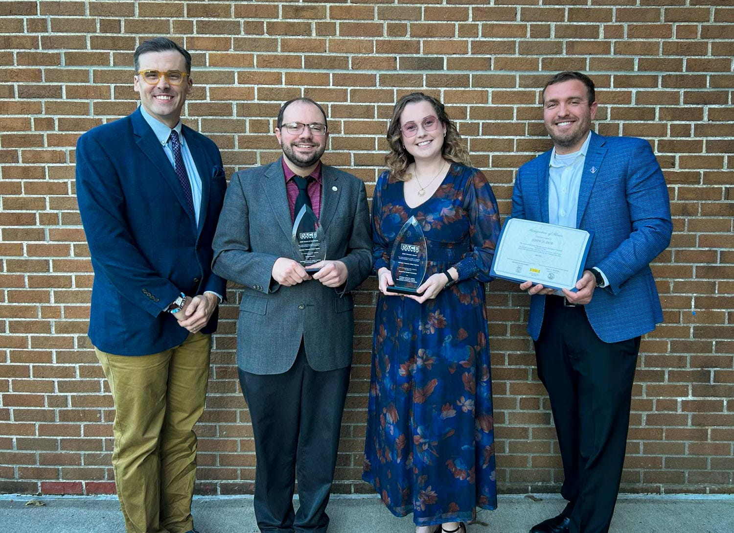MVAA Strategic Communications team poses for a photo with their awards at the Central Michigan Public Relations Society of America Award Cermony