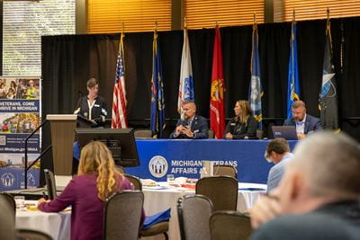 Michigan Veterans Affairs Agency (MVAA) Mental Health and Suicide Prevention Manager Erika Hoover moderates the Serving Special Populations in Your Community panel featuring MVAA Mental Health and Suicide Prevention Analyst Jonathan Garvey, MVAA Homeless Veteran Coordinator Cassie Smith and MVAA Health and Wellness Analyst Steve McCartney at the first Community Outreach and Regional Engagement (CORE) Symposium, Wednesday, Sept. 18.