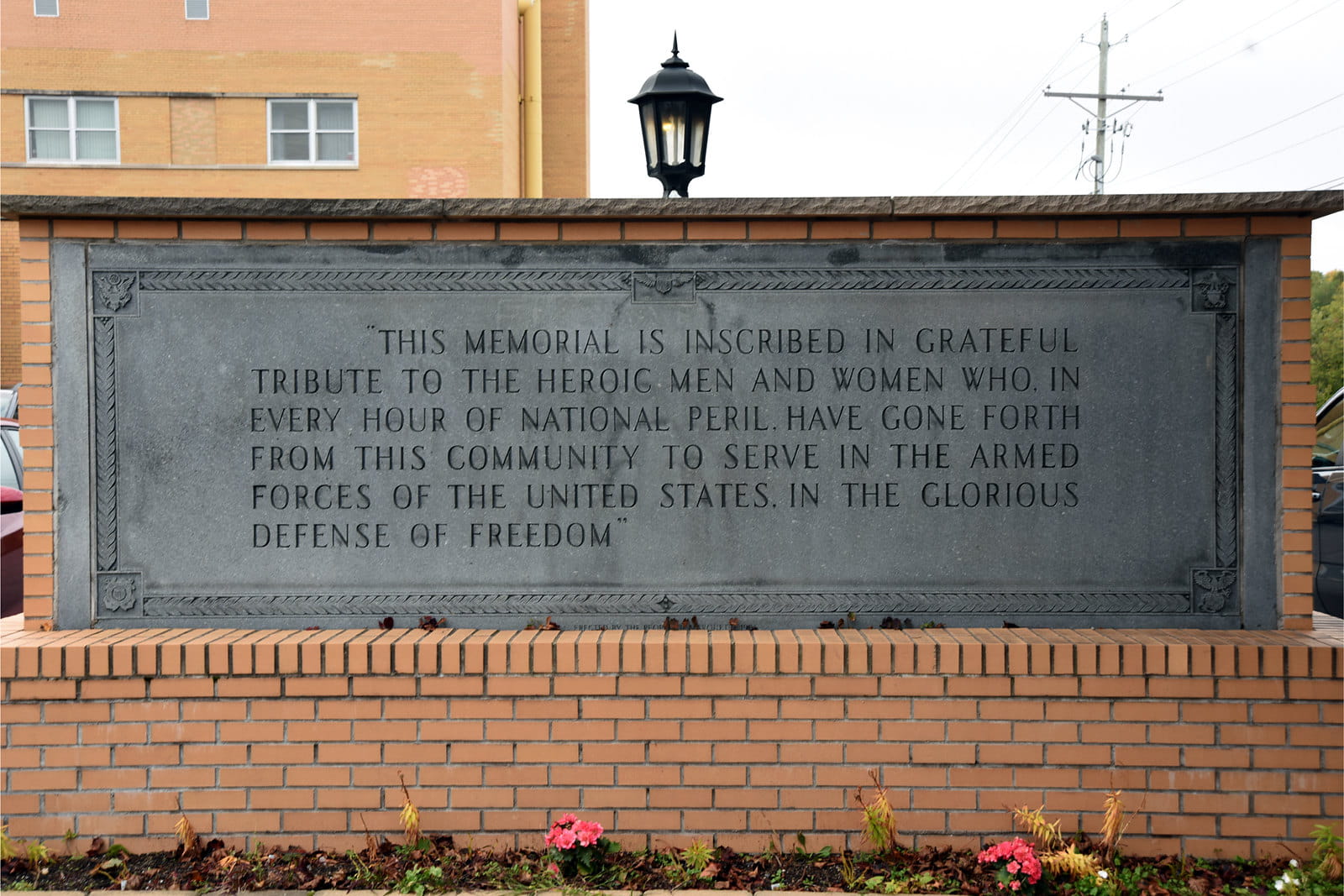 Bronze memorial plaque with inscription