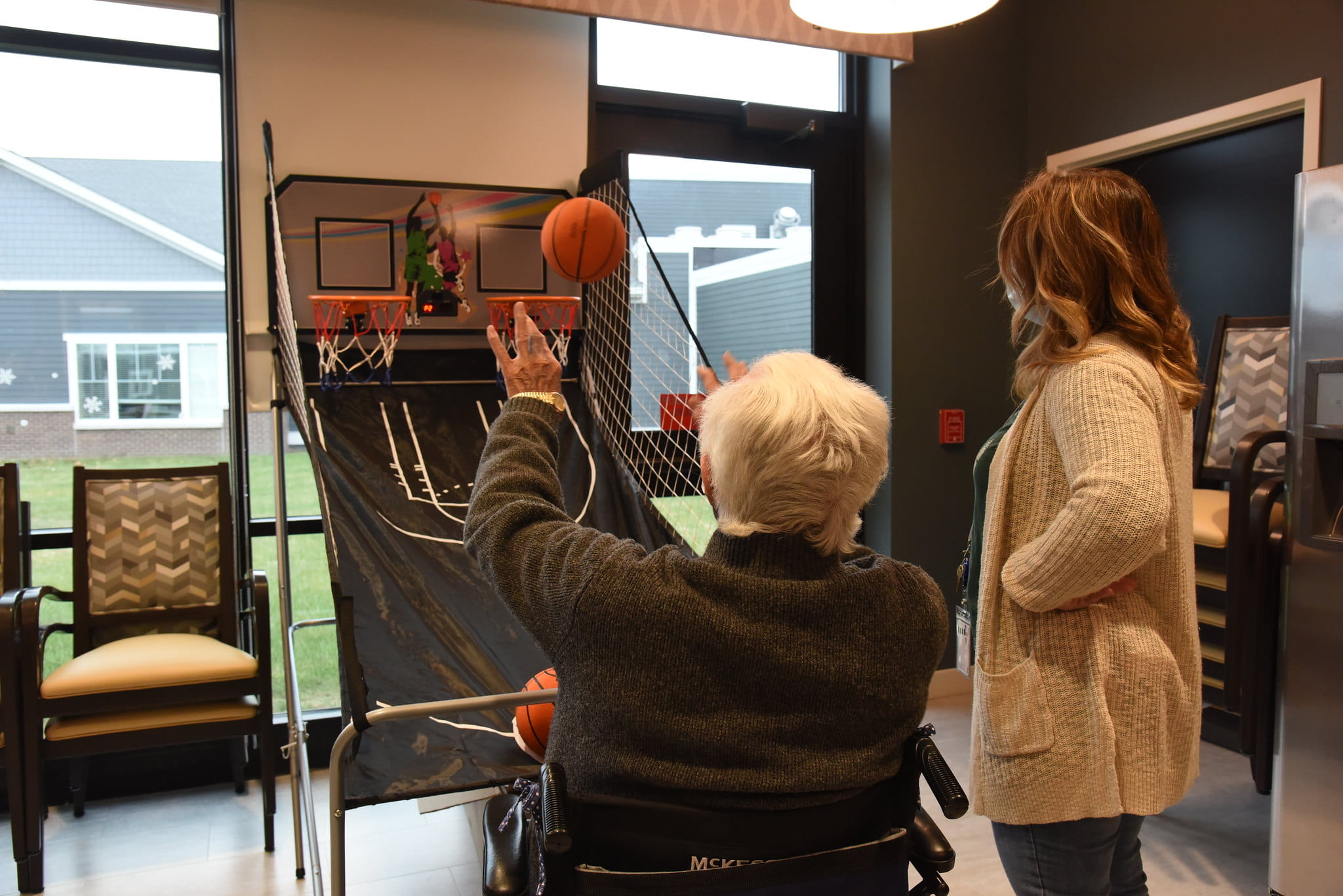 Member shooting hoops.
