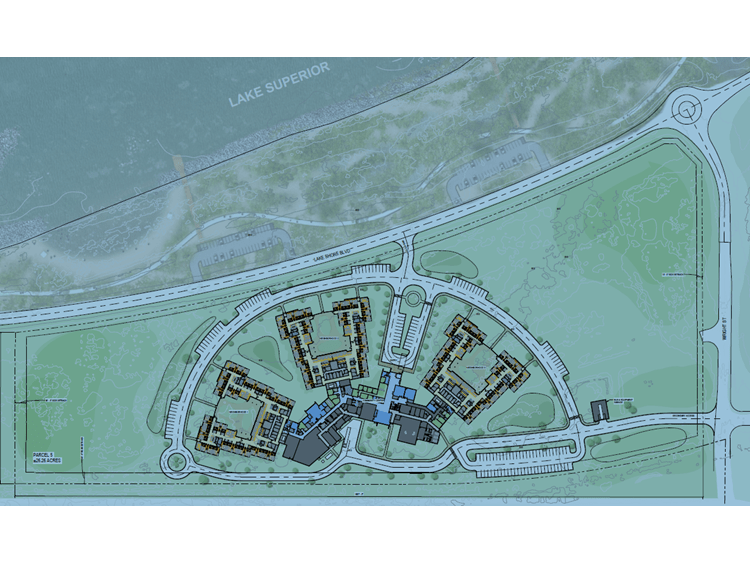 Award recipients stand on stage at the gala displaying their certificate