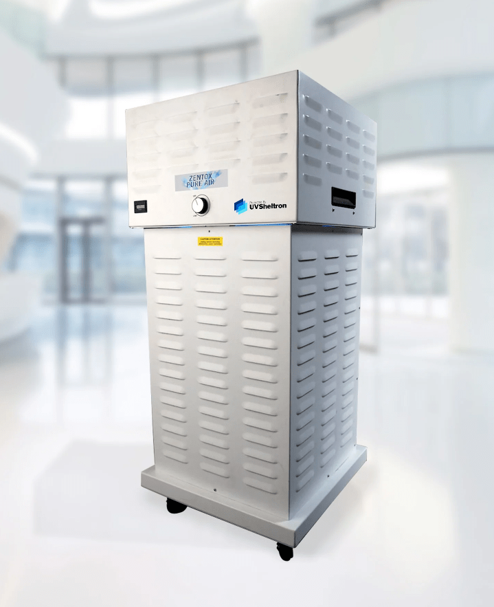 Award recipients stand on stage at the gala displaying their certificate