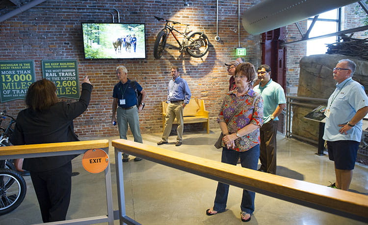 A group of adults tour the OAC