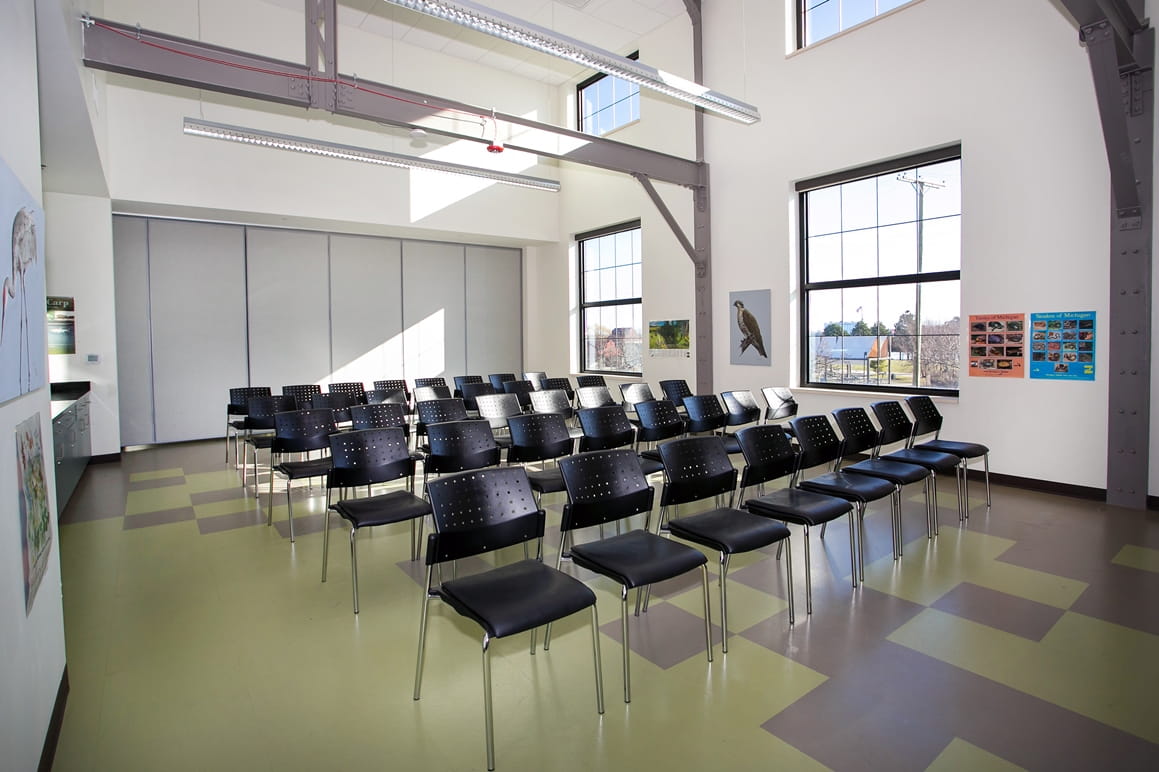 Outdoor Adventure Center Discovery Lab room, set up classroom-style with rows of chairs.