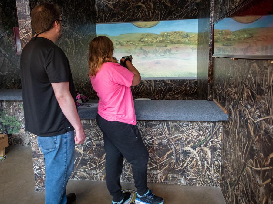 two people use hunting simulator at OAC