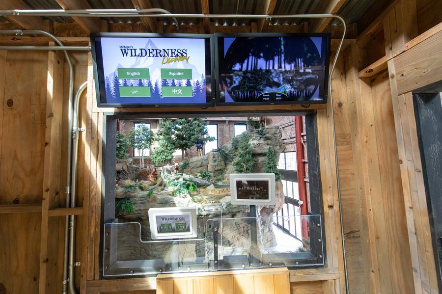 Interior of OAC tower hunting blind and Wilderness Discovery game
