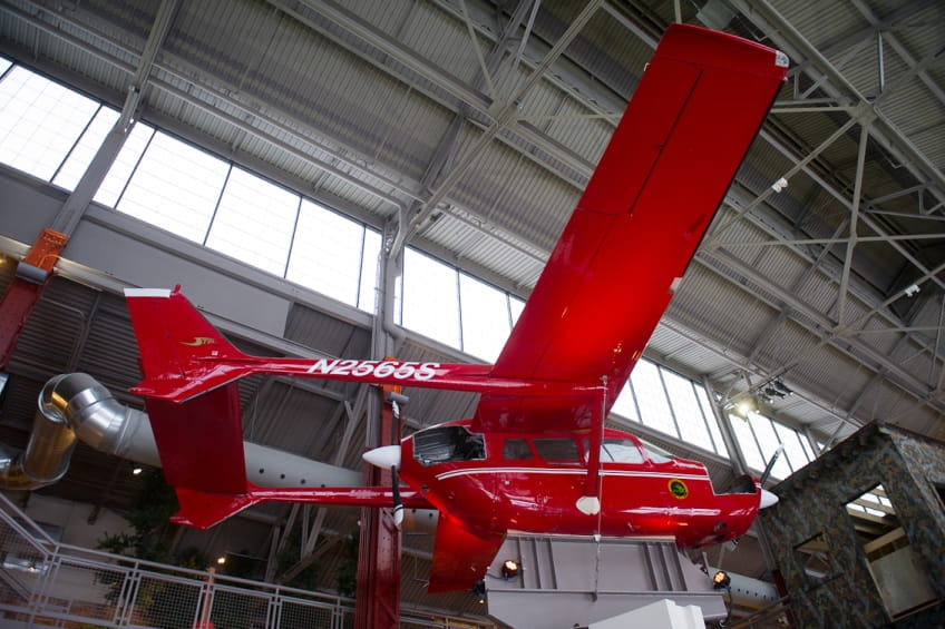 red airplane at Outdoor Adventure Center, from below